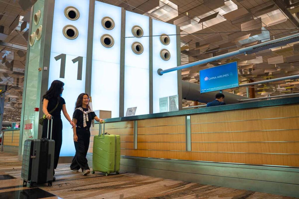 Girls at Changi airport for smooth customs - Los Angeles Itinerary