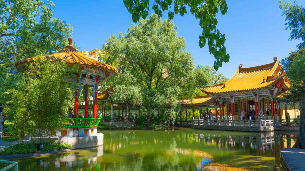 A view of the pavillion, pond, and temple at the Chinese Garden - Chinese Garden