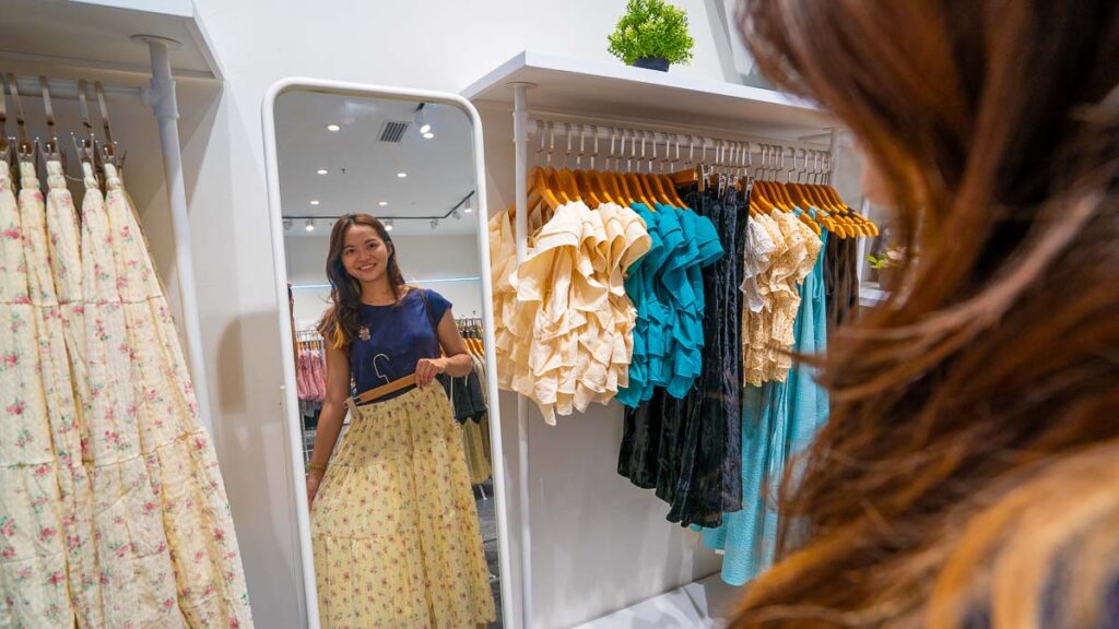 girl trying clothes at Bottled Dreams - KSL city mall