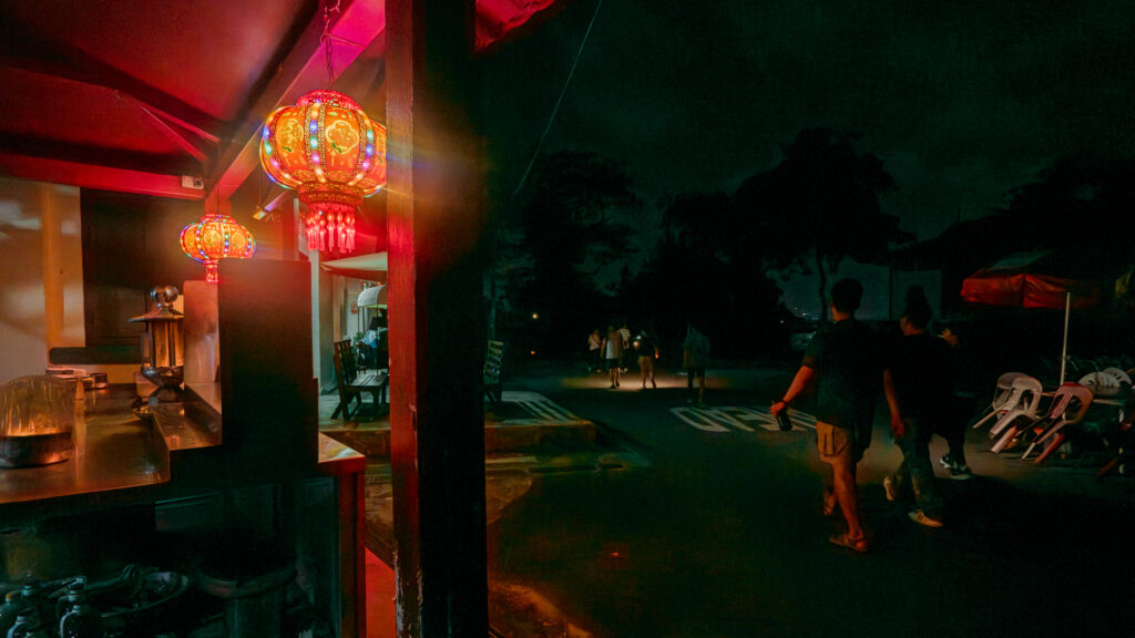 Ghost tour walking past Chinese Temple