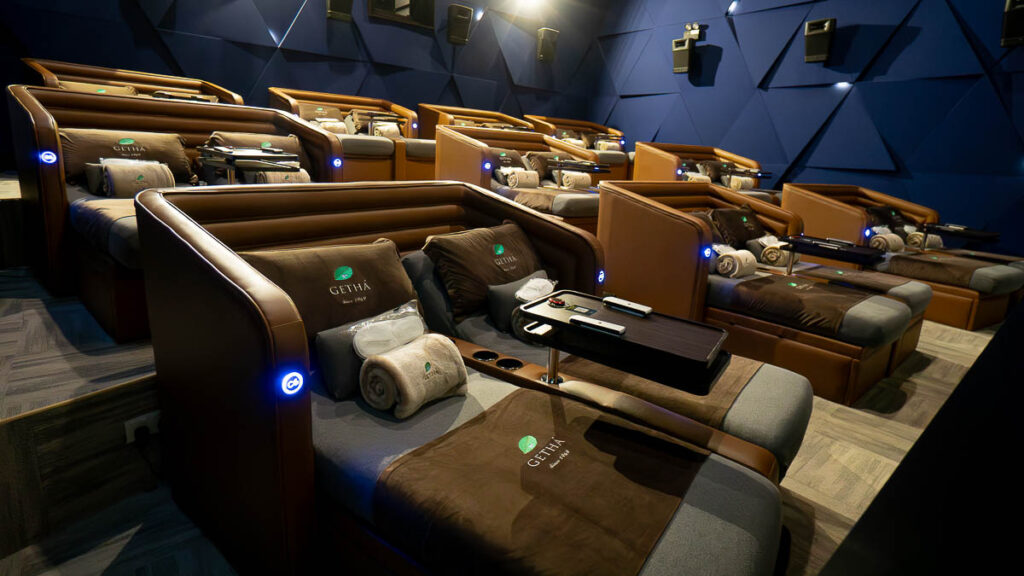 Wide shot of a Hall full of Comfortable Bed Seats of Aurum Theatre