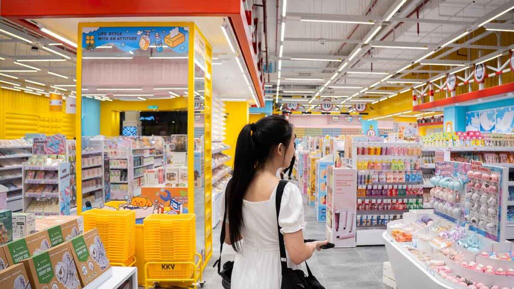 Person wandering in KKV with vibrant yellow background