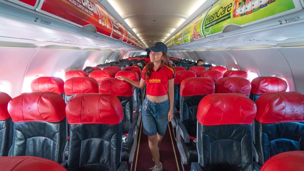 Girl on AirAsia Flight to Bali - 3d2n Bali Itinerary
