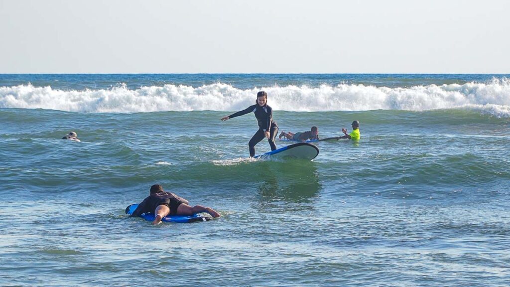 Girl Surfing at Batu Bolong Beach - 3d2n Bali Itinerary