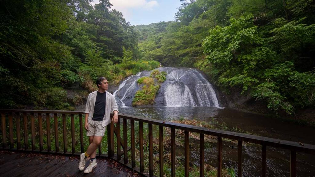 Boy in front of Kamabuchi Falls, Iwate, Japan - Tohoku Itinerary