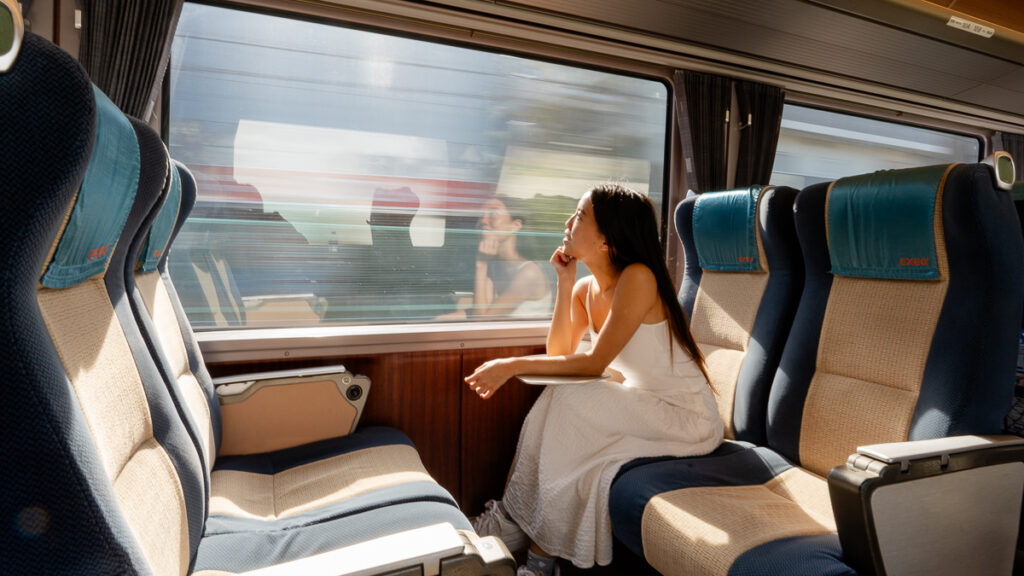 Girl looking out of romance car window – Hakone Itinerary