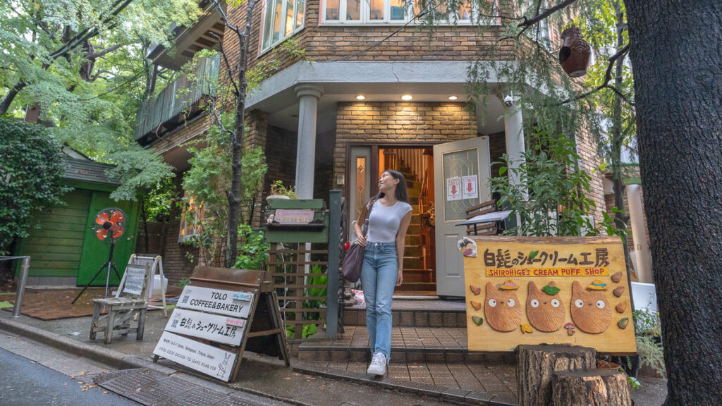 Girl standing outside Shorihiges Cream Puff Factory – Hakone Itinerary