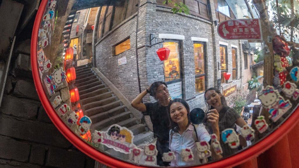 Friends Taking Picture at Mountain City Alley - Chongqing Itinerary