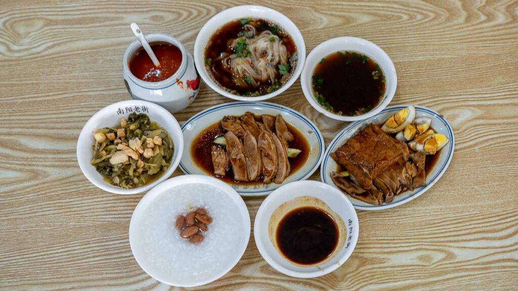 Flatlay of Braised Duck Kway Chap and other braised dishes in Nanyang Street Kway Chap Mount Austin