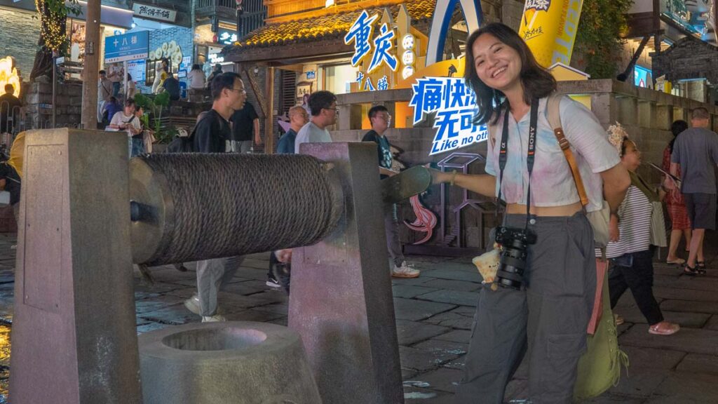 Girl at Shi Ba Ti Well - Chongqing Itinerary