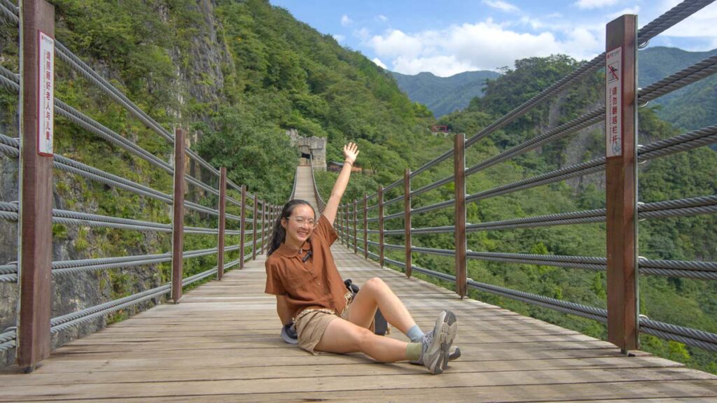 Girl on Wuling Suspension Bridge - Chongqing Itinerary