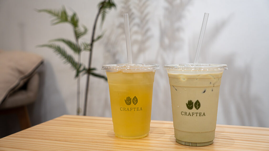Close-up of two drinks at Craftea - Rich Genmaicha Latte and Sencha Kyoto Tea
