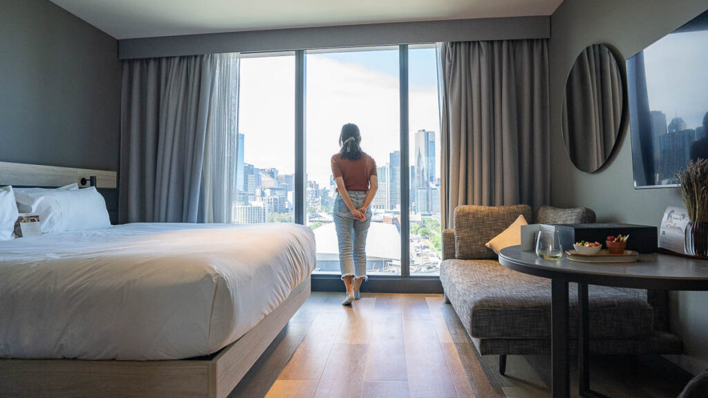 Girl at AC Hotel Melbourne Room Interior - AC Hotel Melbourne Southbank Review