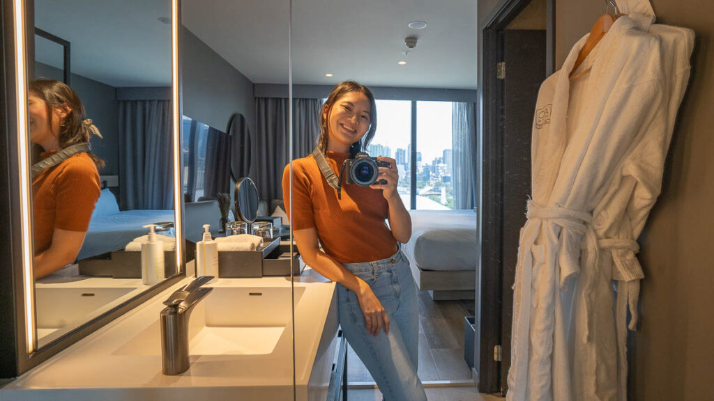 Girl at AC Hotel Melbourne Vanity Area - AC Hotel Melbourne Southbank Review