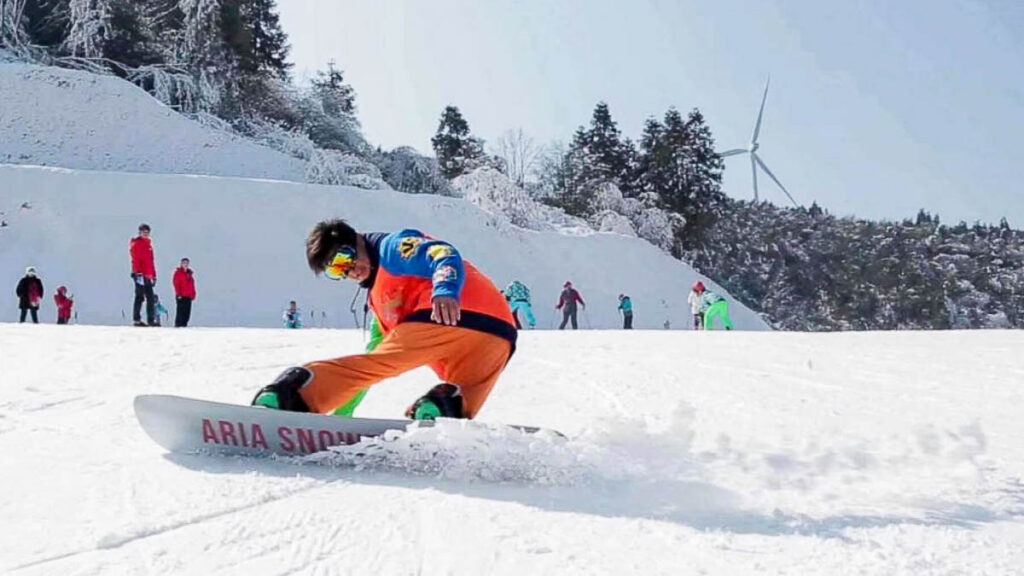 Person snowboarding at Fairy Mountain during winter.