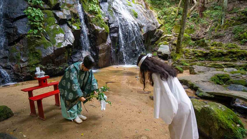 Priest blessing during Takigyo ritual in Miyazu -Kyoto by the Sea