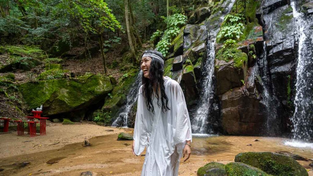 Girl drenched after waterfall purification ceremony in Miyazu - Things to do in Miyazu