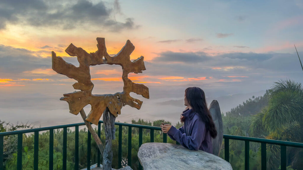 Girl watching the sunrise at Sonnen Berg Mountain View - Davao Highlights Things to do