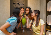 Girls drinking big matcha - Things to do in Ho Chi Minh City