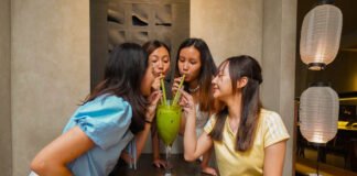 Girls drinking big matcha - Things to do in Ho Chi Minh City