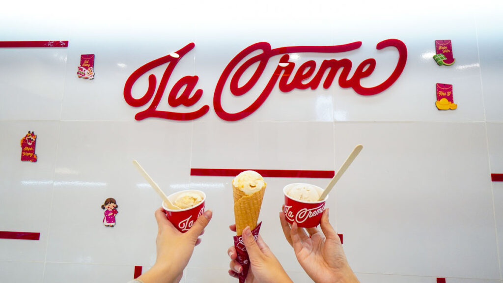 Hands Holding Up Ice Cream - Saigon cafes