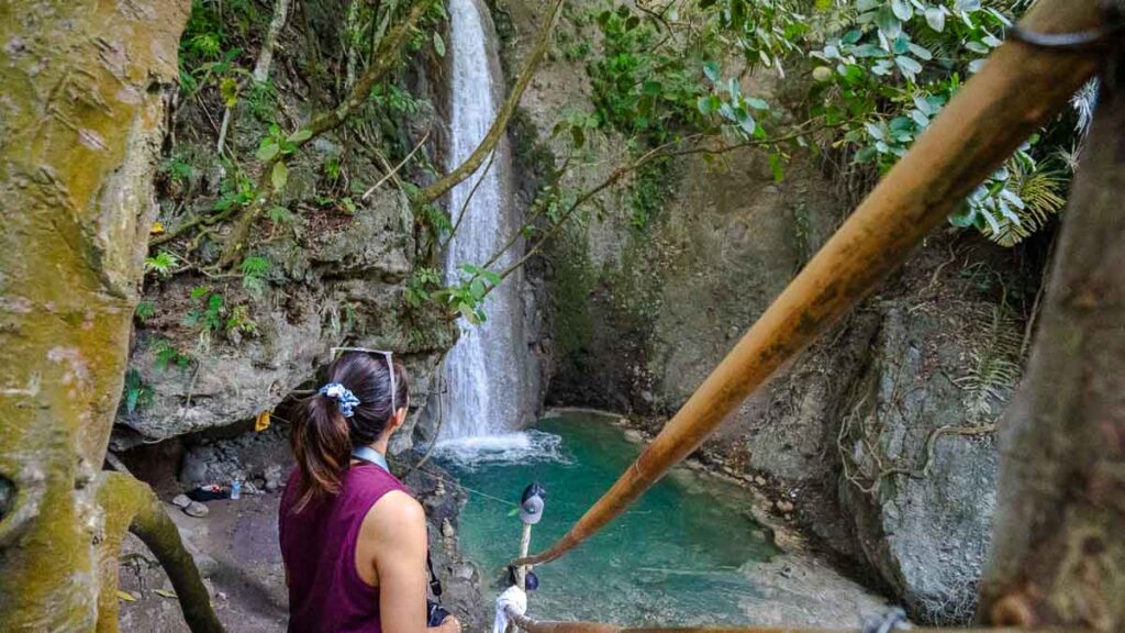 Girl admiring Magongawong Waterfall on Samal Island - Things to do in Davao