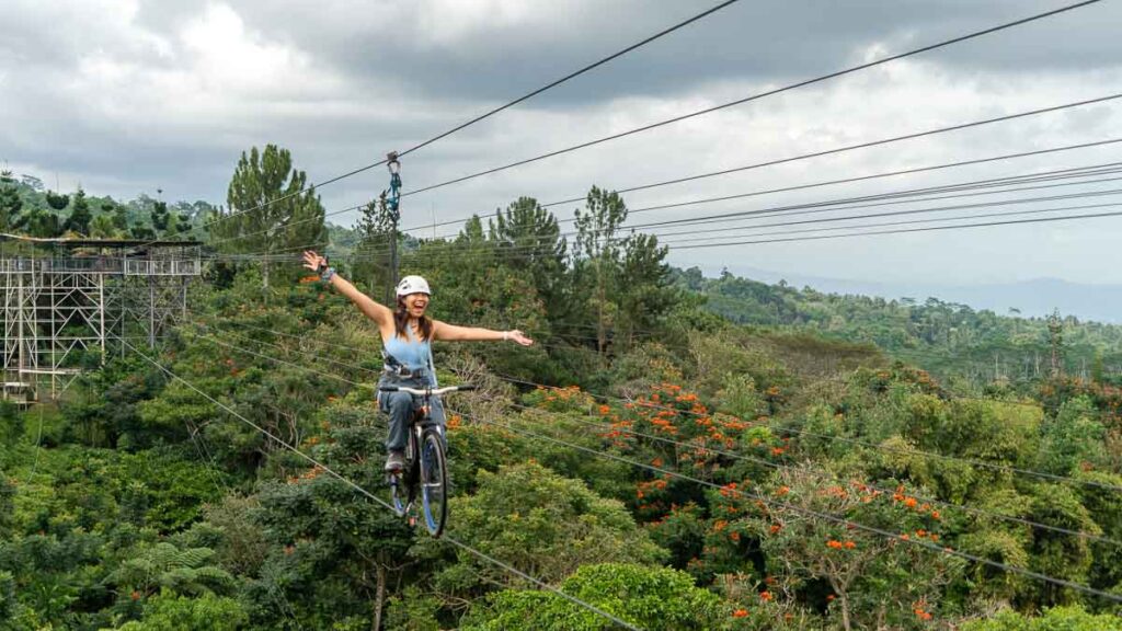 Girl on the SkyCycle ride at Eden Adventure Park - Davao Guide