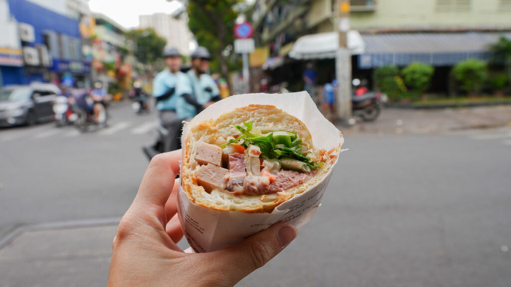 Hand holding Banh Mi - Ho Chi Minh City Budget Itinerary