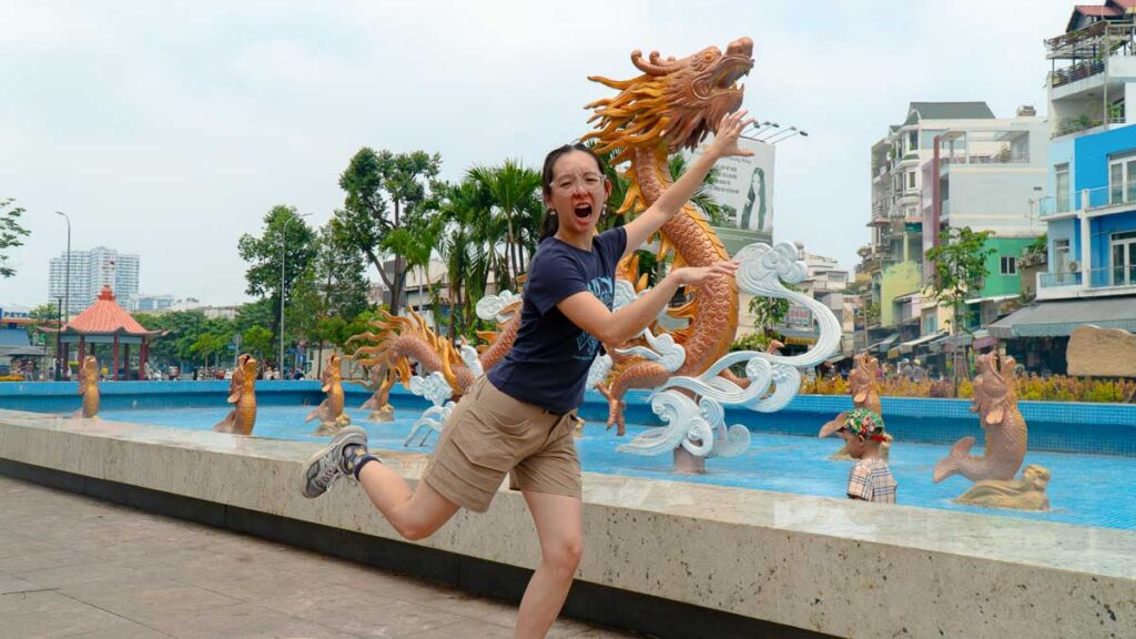 Girl Posing in front of statue - Ho Chi Minh City Budget Itinerary