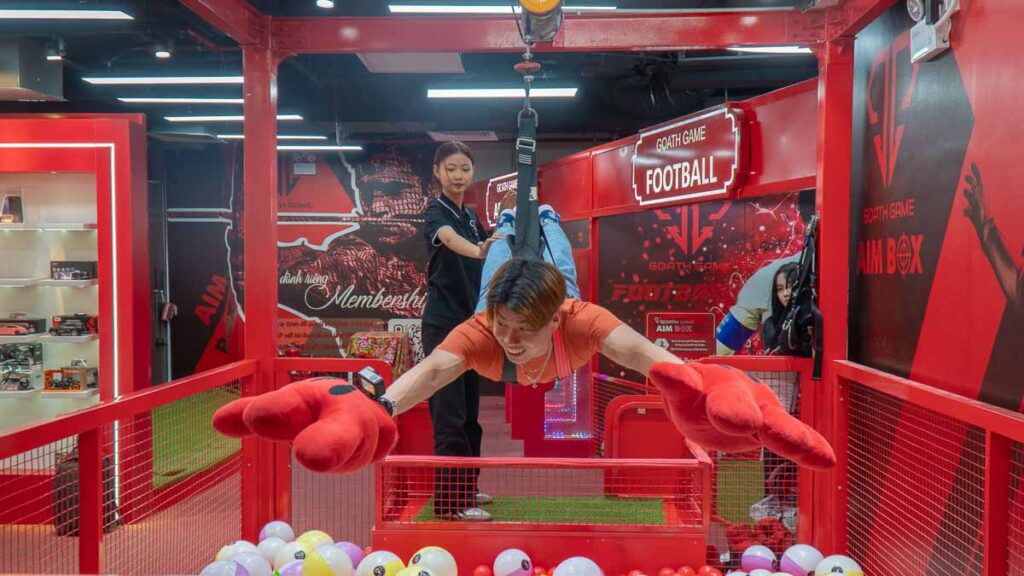 Man Hanging of Claw Machine - Ho Chi Minh City Budget Itinerary