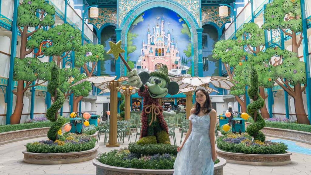 Girl at Disney Imagination Garden Castle - Disney Adventure Cruise Review