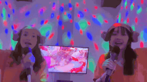 Two girls singing Karaoke in Spa - Ho Chi Minh City Bootcamp TTI21