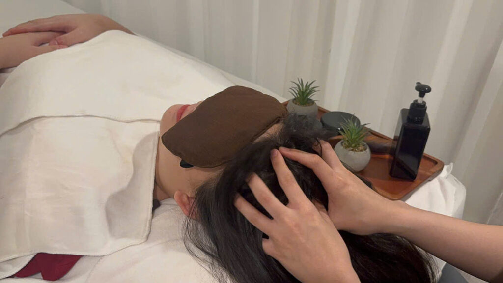 Girl getting head massage - Ho Chi Minh City Weekend Itinerary