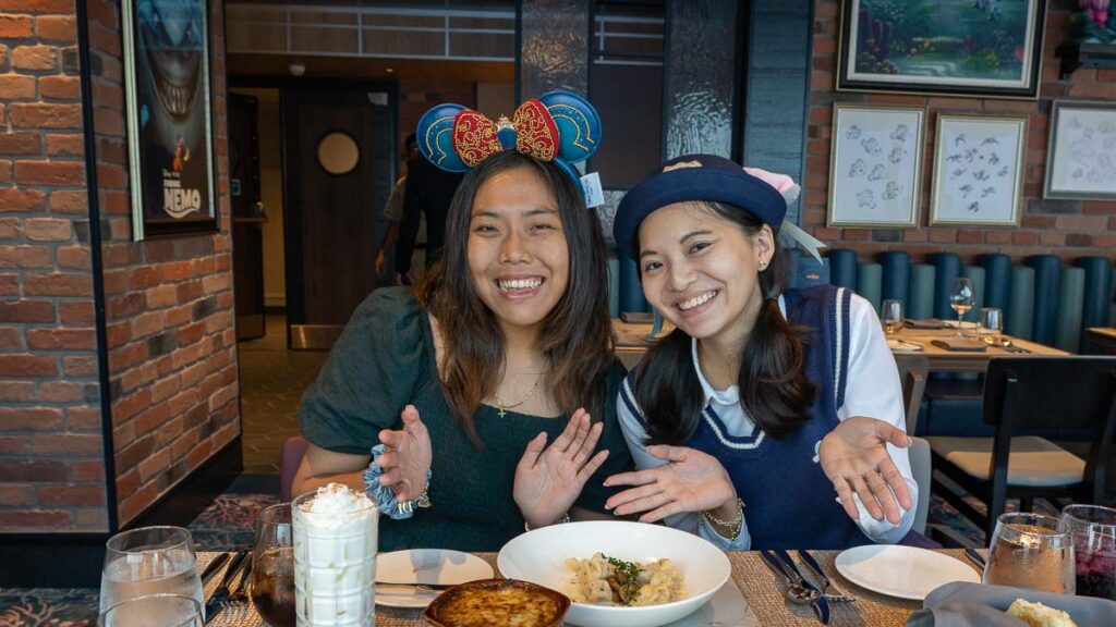 Girls at Pixar Market Restaurant - Disney Adventure Cruise Review