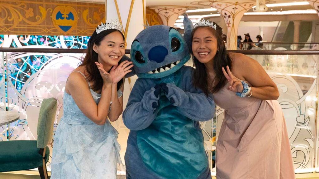 Girls Meeting Stitch - Disney Cruise Singapore Tips