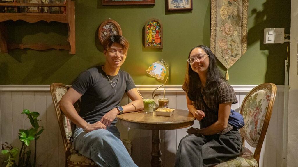 A boy and girl at a cafe - Ho Chi Minh City Budget Itinerary