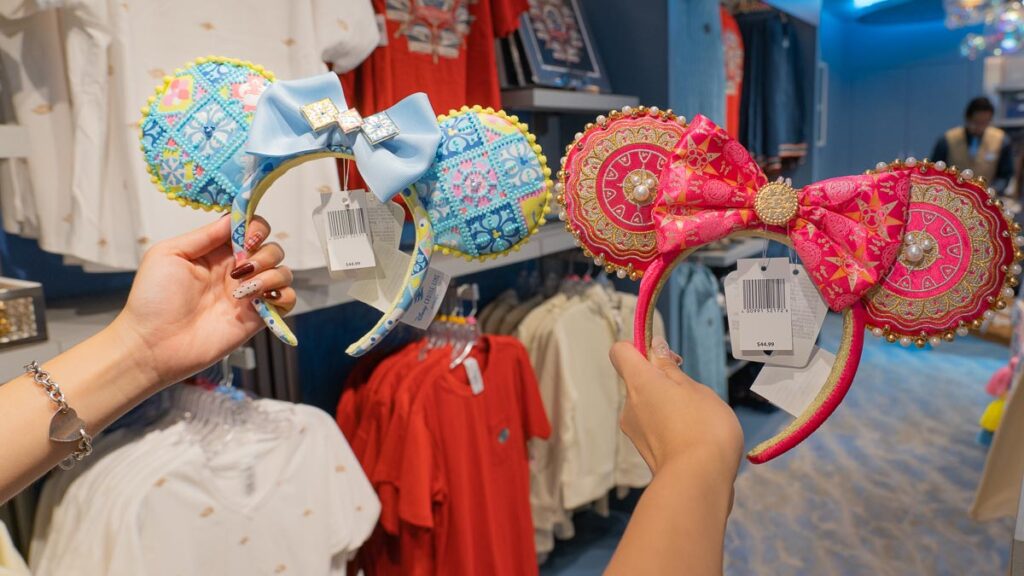 Hands Holding Disney Headbands - Shopping on the Disney Adventure Cruise