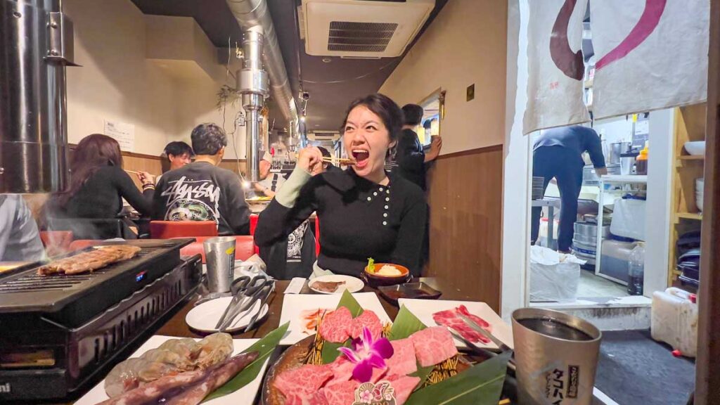 Girl eating at wagyu yakiniku buffet - Hidden gems Osaka