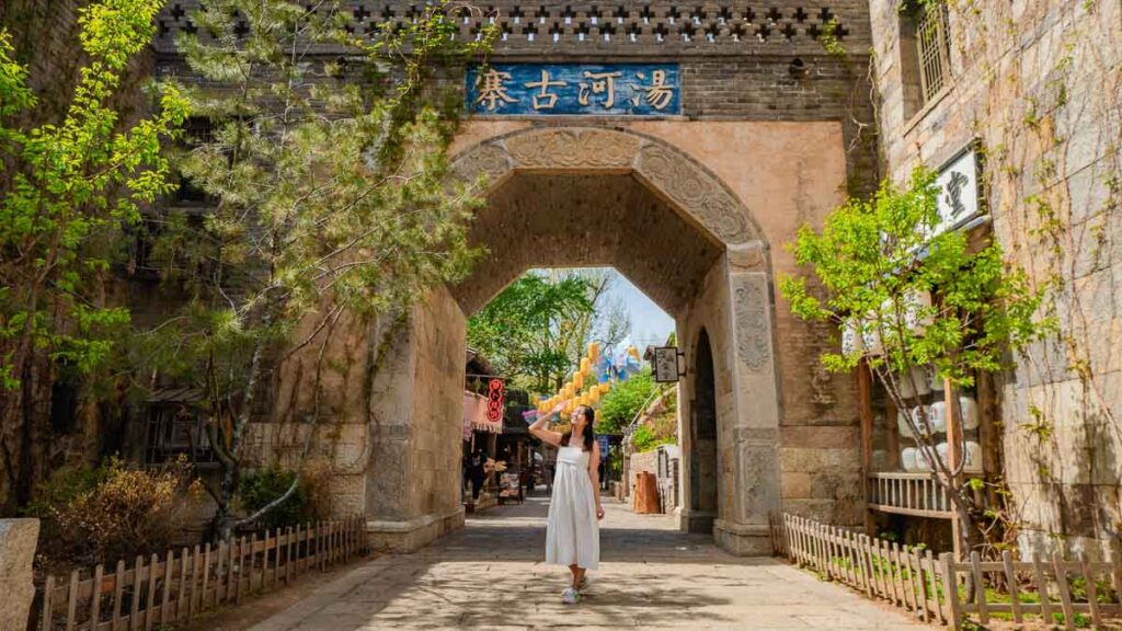 Girl in front of a Watertown structure - Beijing Itinerary