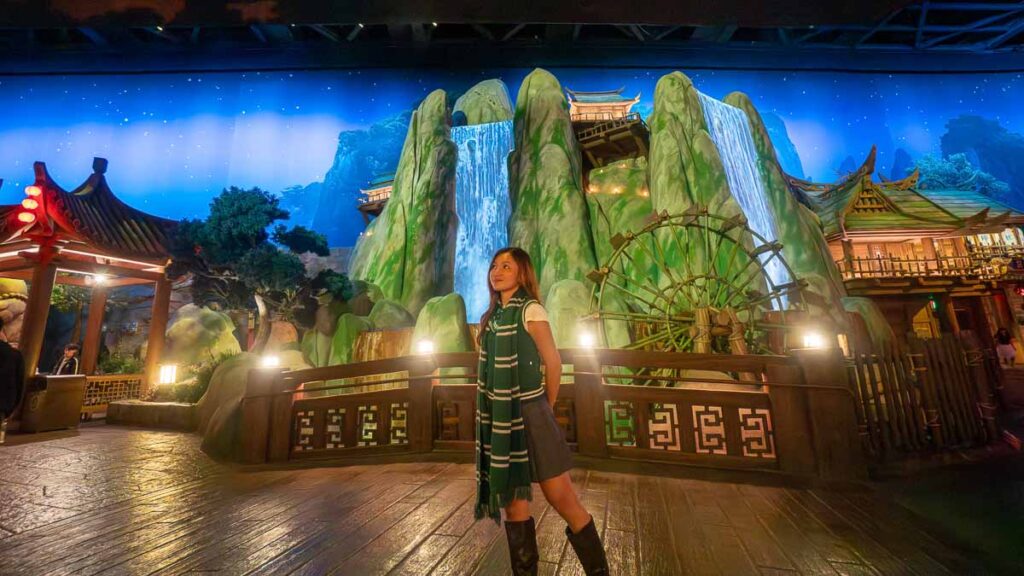 Lady Standing In Front of Kung Fu Panda Land Waterfall - Universal Studio Beijing Guide