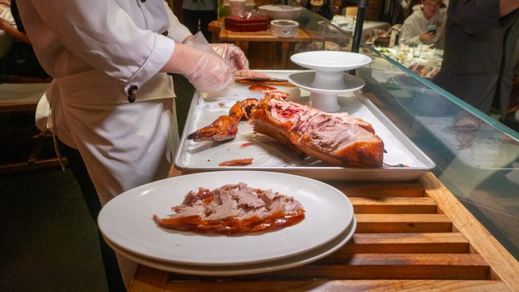 Man Cutting Peking Duck - Beijing Itinerary