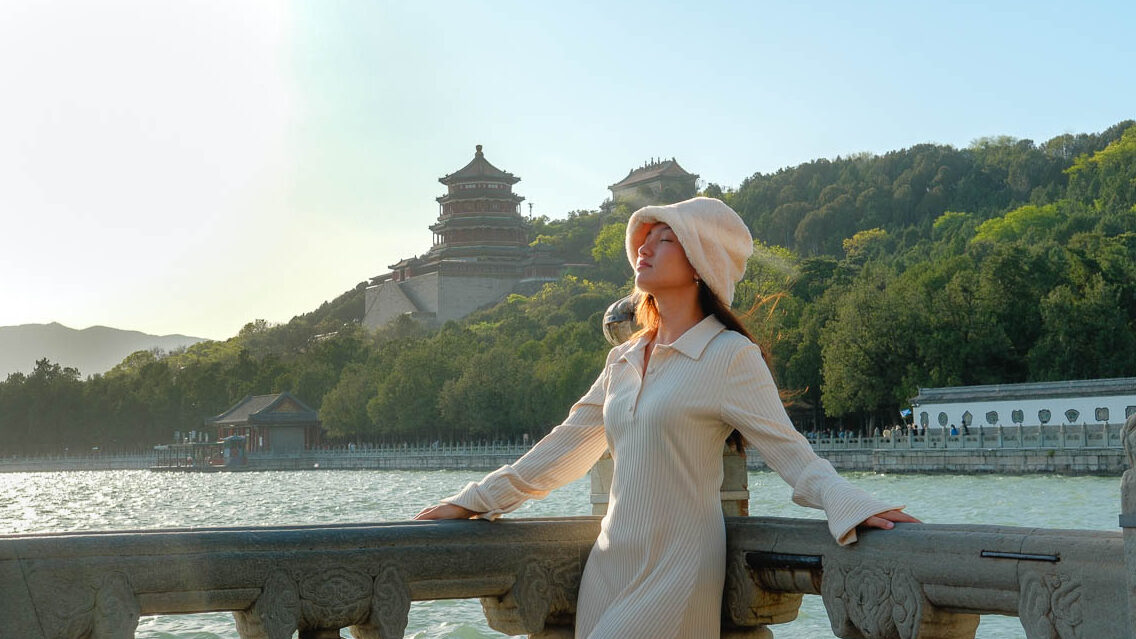 Lady standing beside a huge Lake - Beijing Itinerary