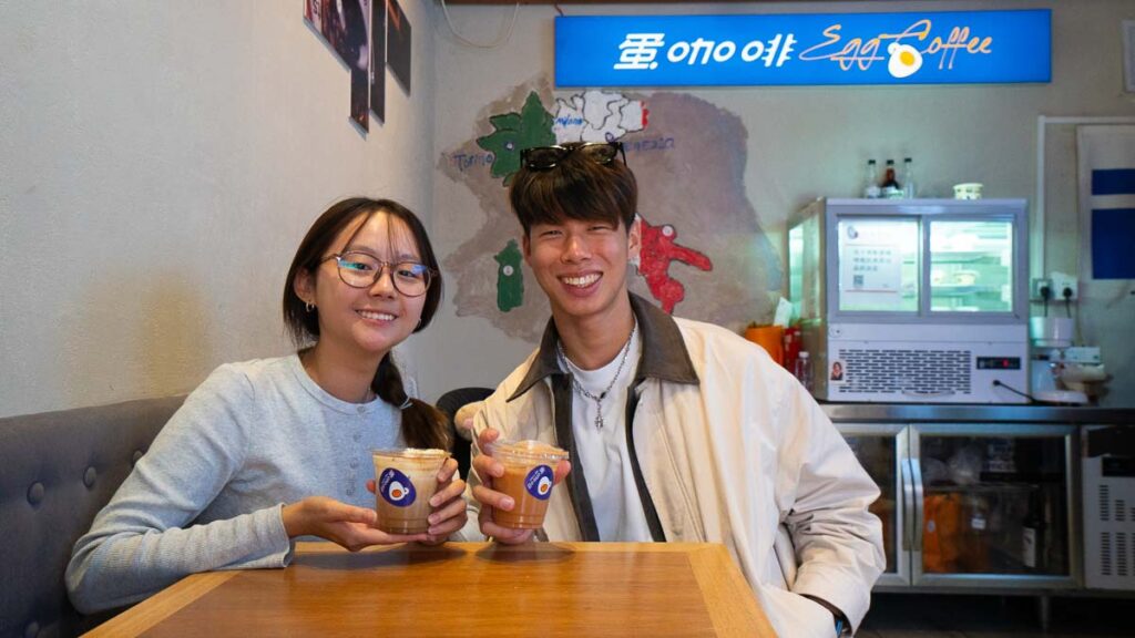 Two people enjoying drinks at a cafe - Beijing Itinerary