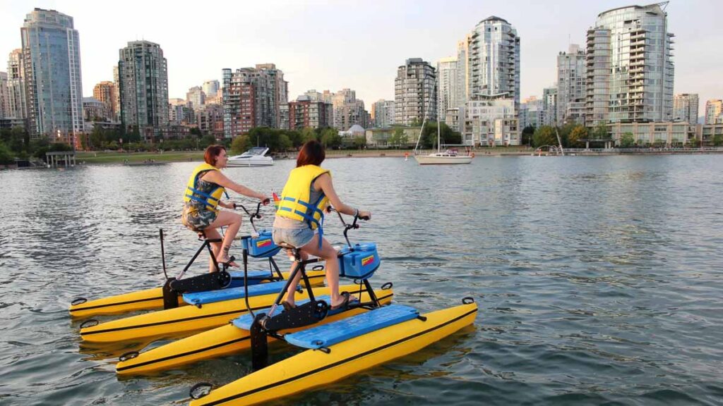 Girls water biking on water - Things to do in Vancouver