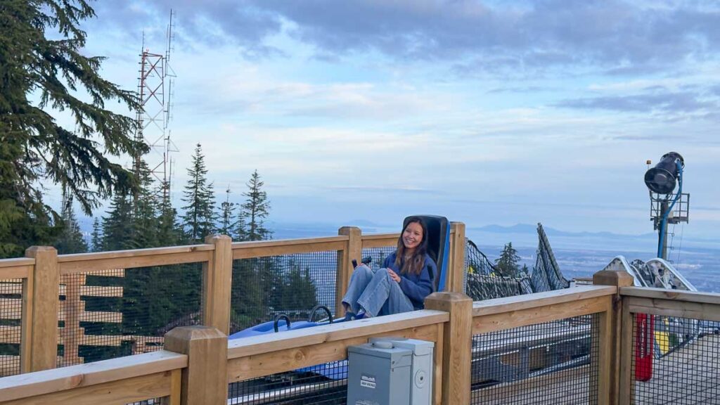Girl on gravity coaster - Vancouver Guide