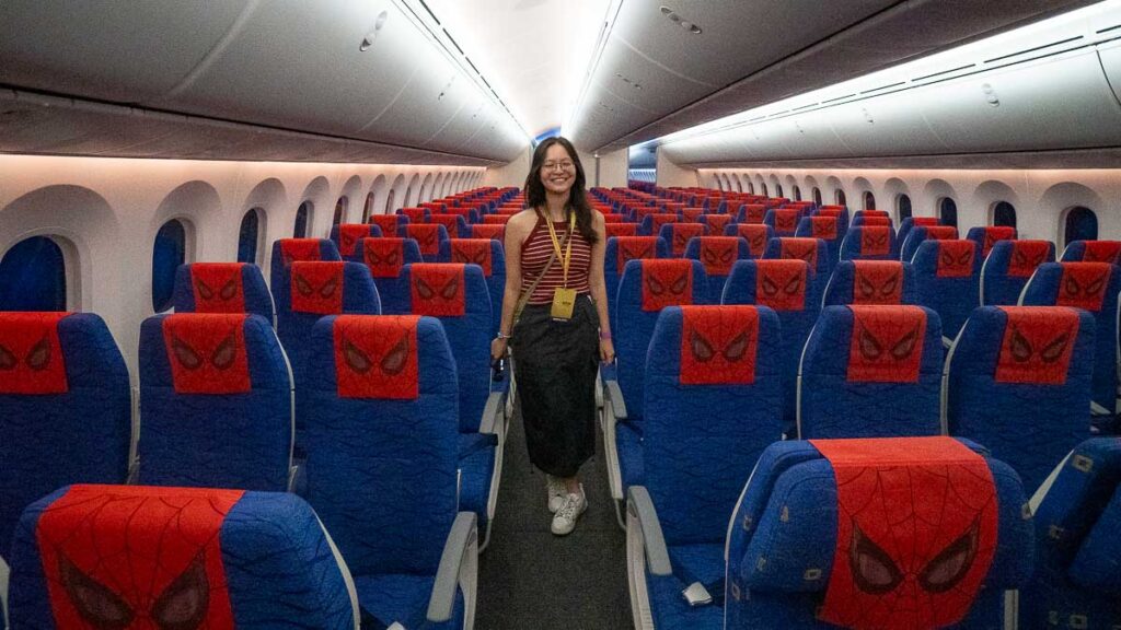 Girl in Cabin Interior - Scoot Spider-Man Flight