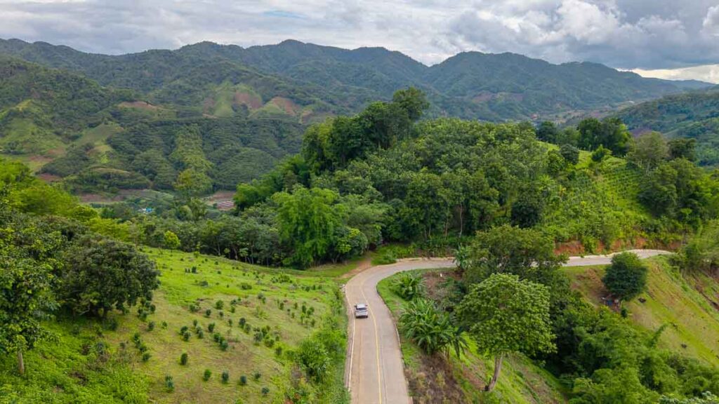 Drone shot of car in Chiang Rai - Chiang Rai Road Trip
