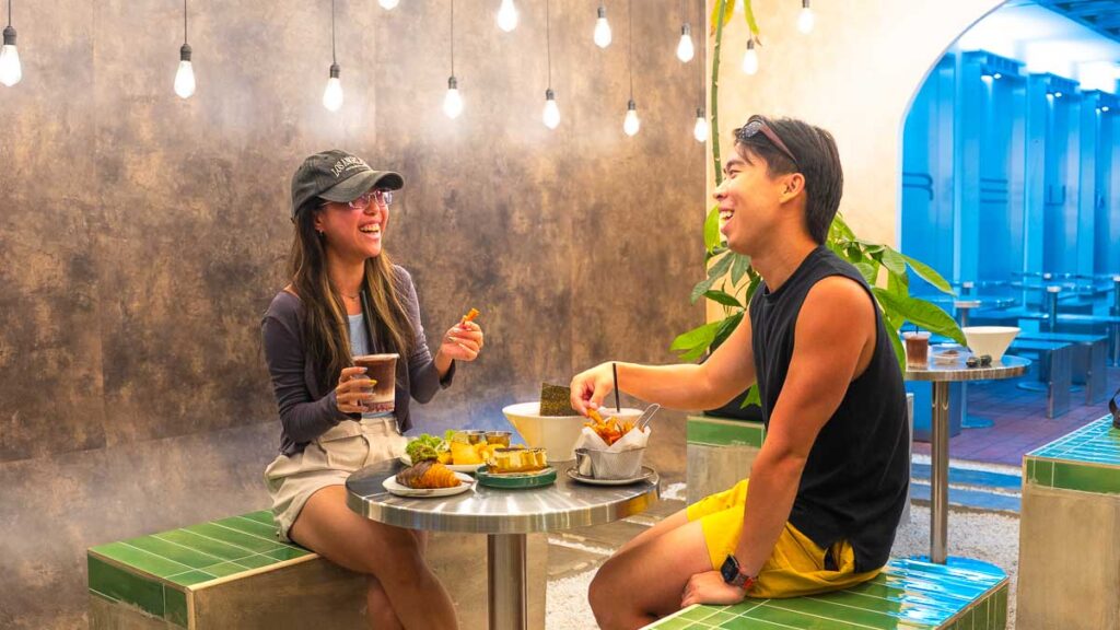 Two People Eating at Brew by Atas
