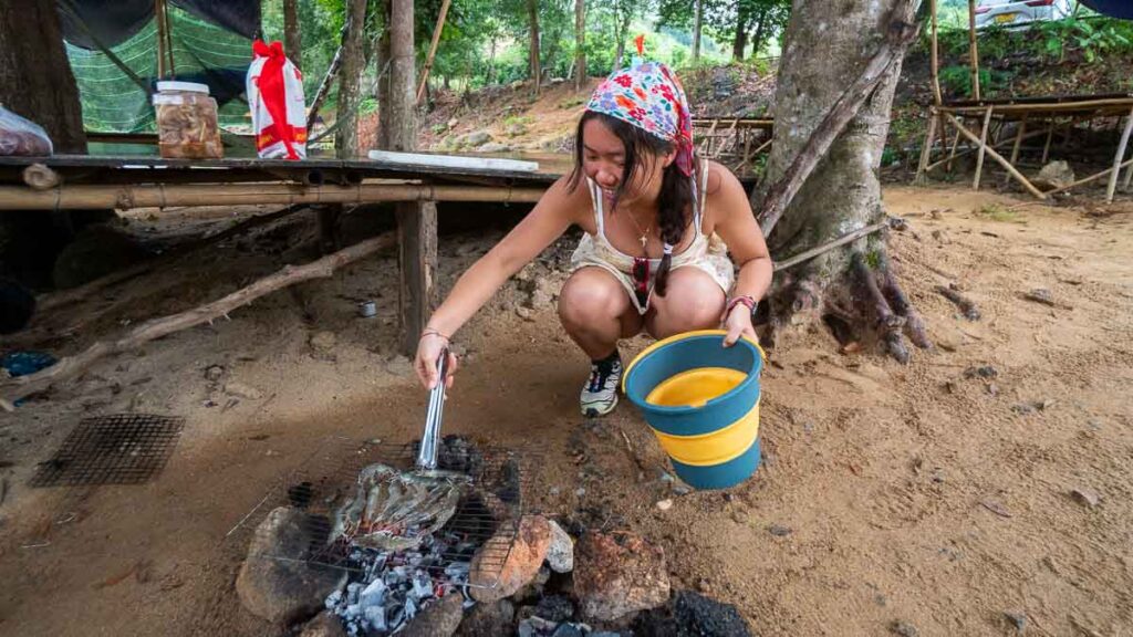Girl cooking prawns in the national park - Nha trang attractions
