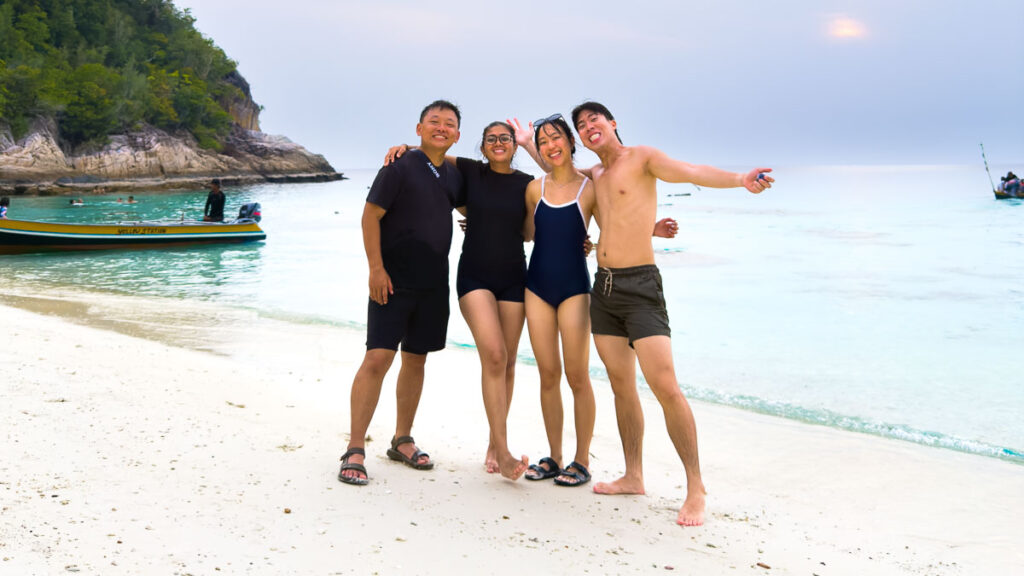 Group of people at Perhentian Islands Beach - Things to do in Kota Bharu
